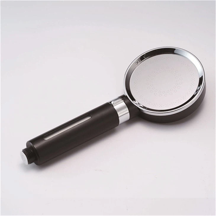 black shower head and handheld